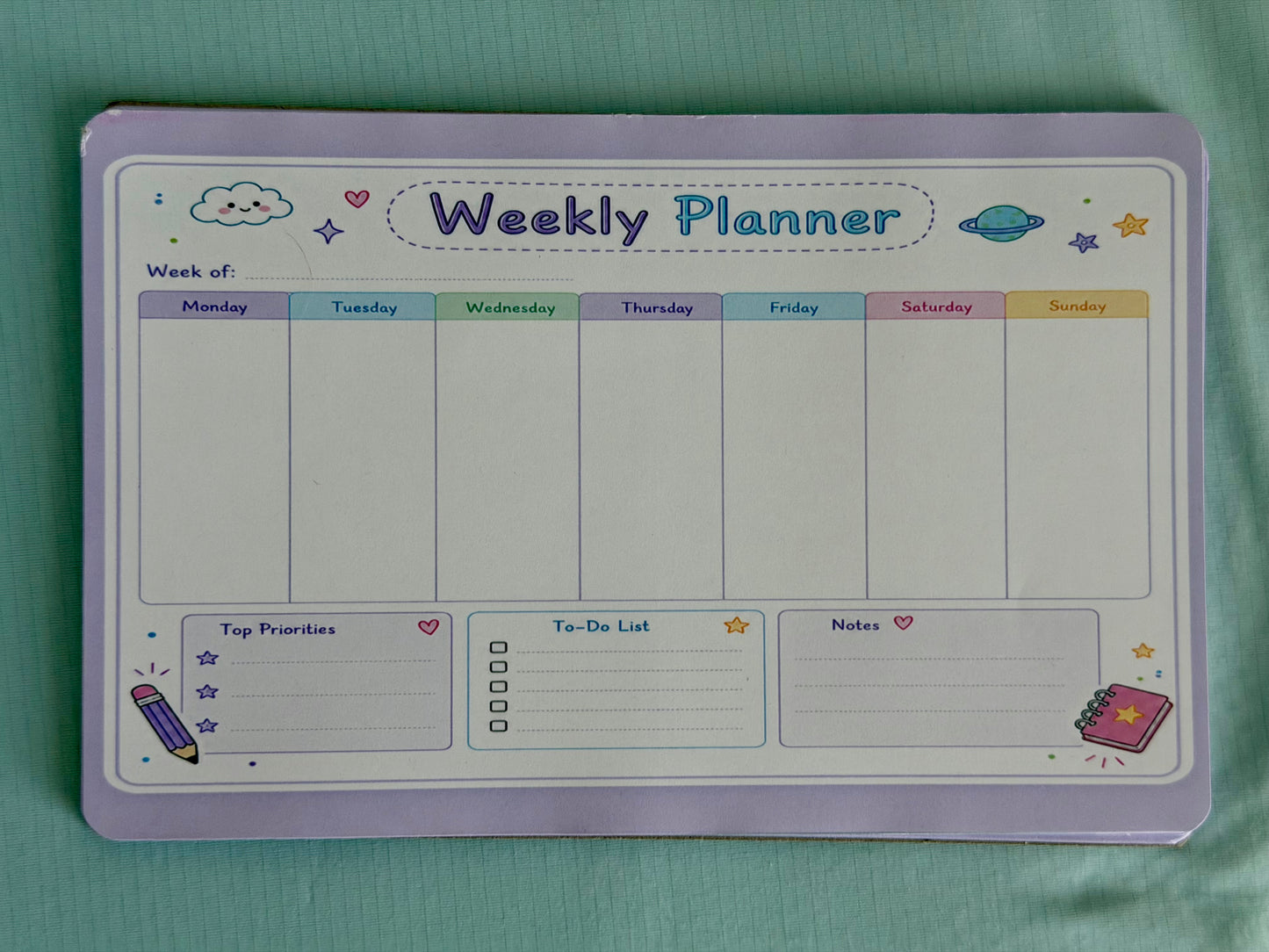 Starburst Days Weekly Planner – Handmade Celestial Pastel | Mon–Sun Layout with Priorities & NotesStarburst Days Weekly Planner – Handmade Celestial Pastel | Mon–Sun Layout with Priorities & Notes